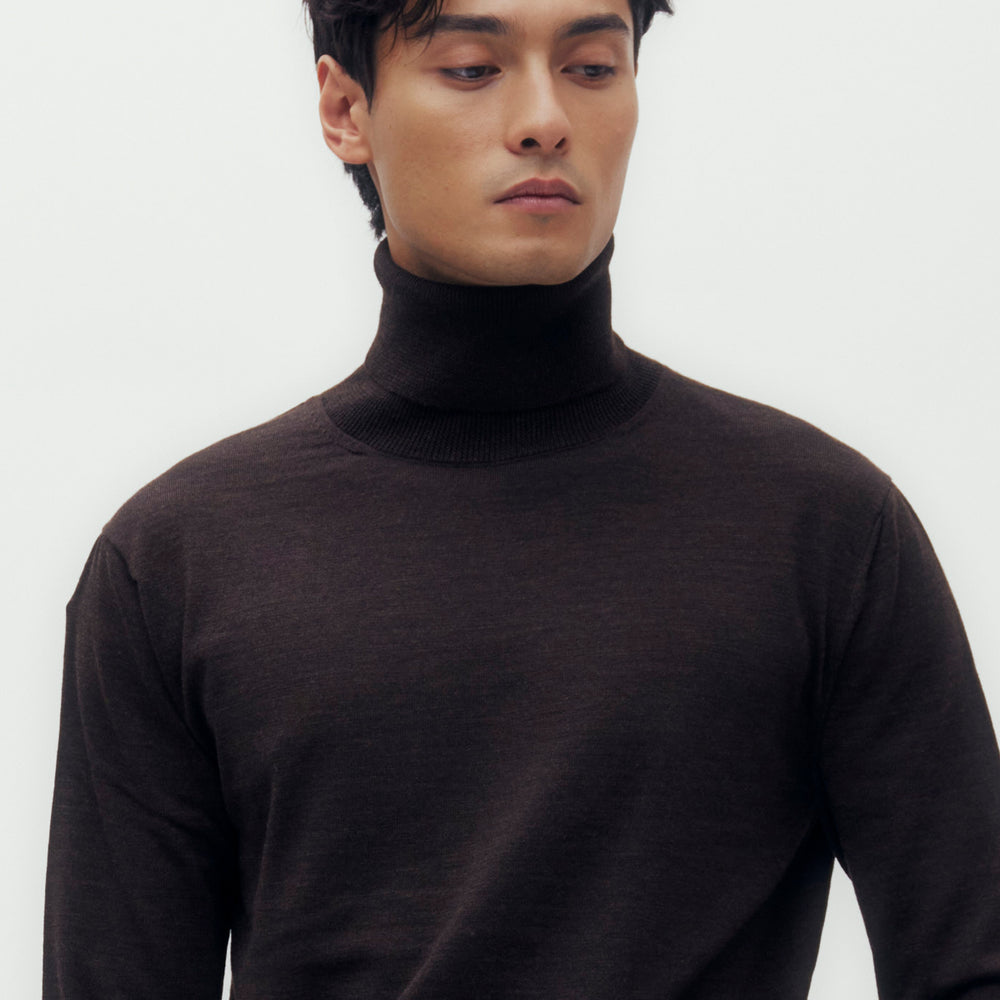 
                      
                        High Neck Wool Sweater
                      
                    