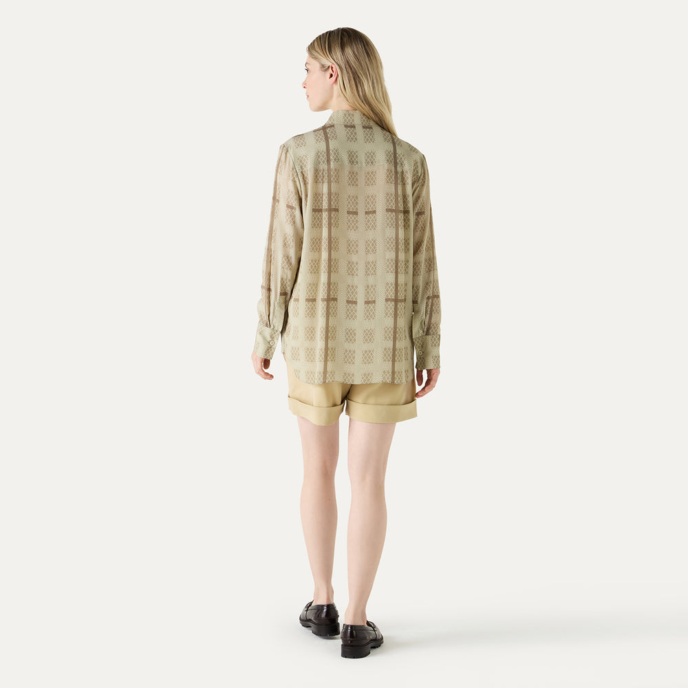 
                      
                        Geo Check Woven Blouse DAKS L
                      
                    