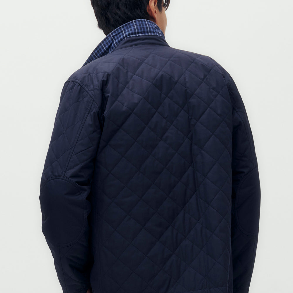 
                      
                        Reversible Quilted Blouson Jacket
                      
                    