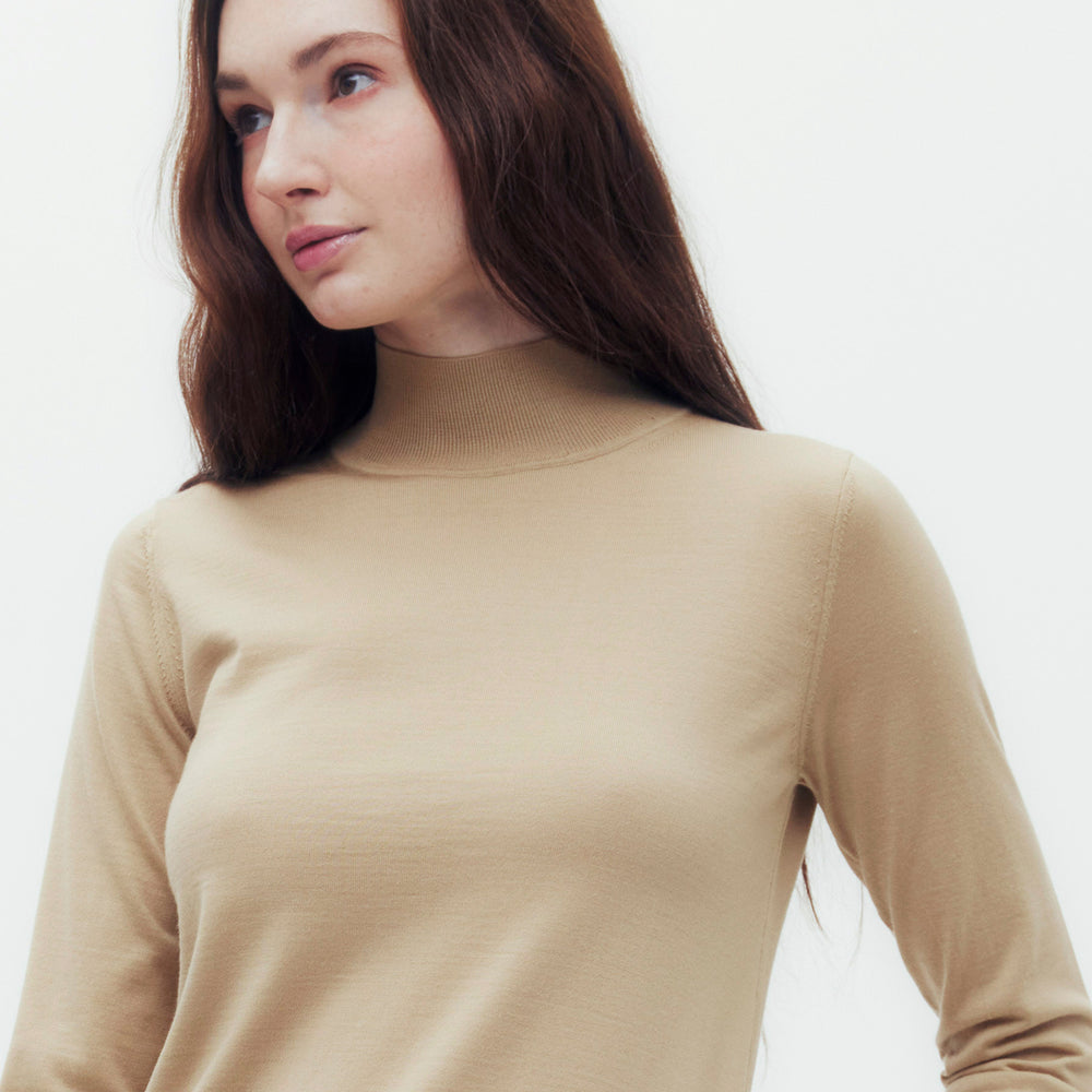 
                      
                        High Neck Sweater
                      
                    