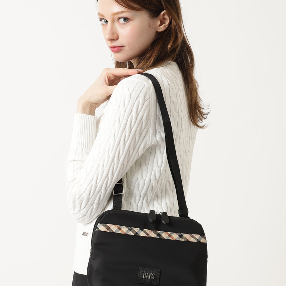 
                      
                        DAKS Top Zip Bag
                      
                    