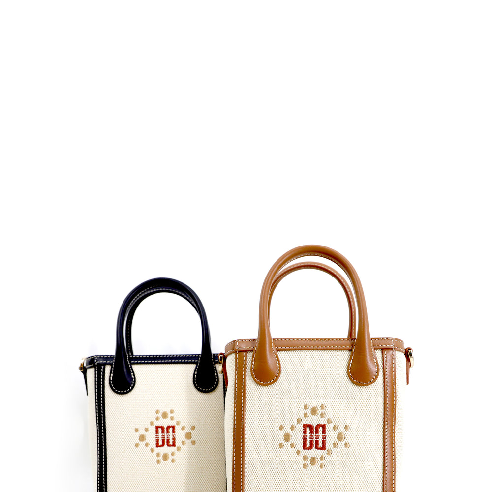 
                      
                        DD Logo Mini Tote Bag
                      
                    