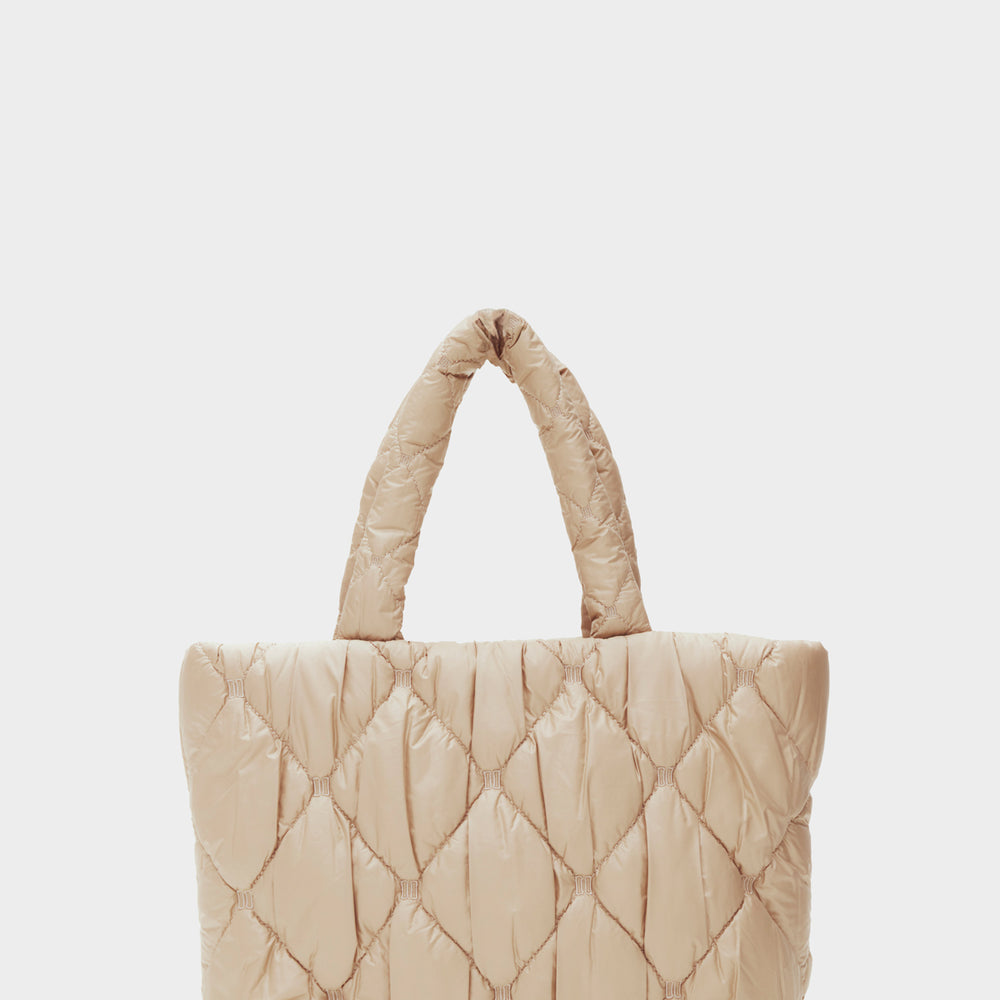 
                      
                        DD Puffer Quilted Tote Bag
                      
                    